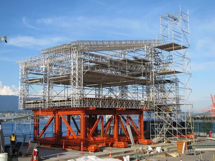 Large industrial scaffolding structure supporting a construction platform