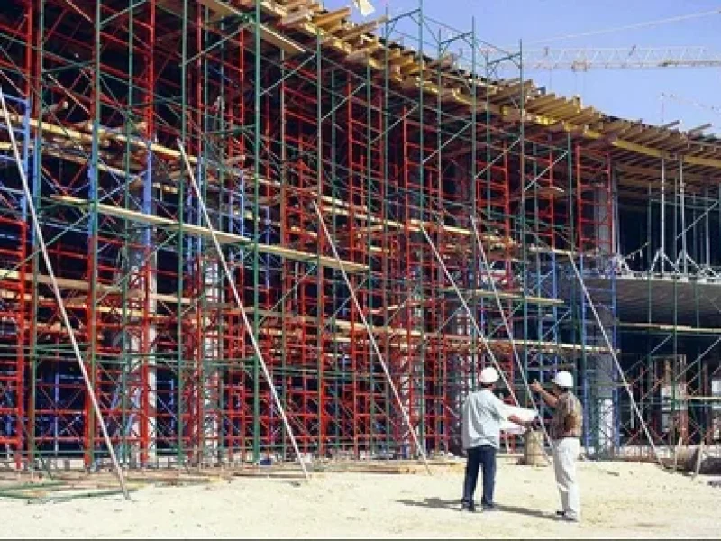Construction scaffolding on a multi-story urban building site
